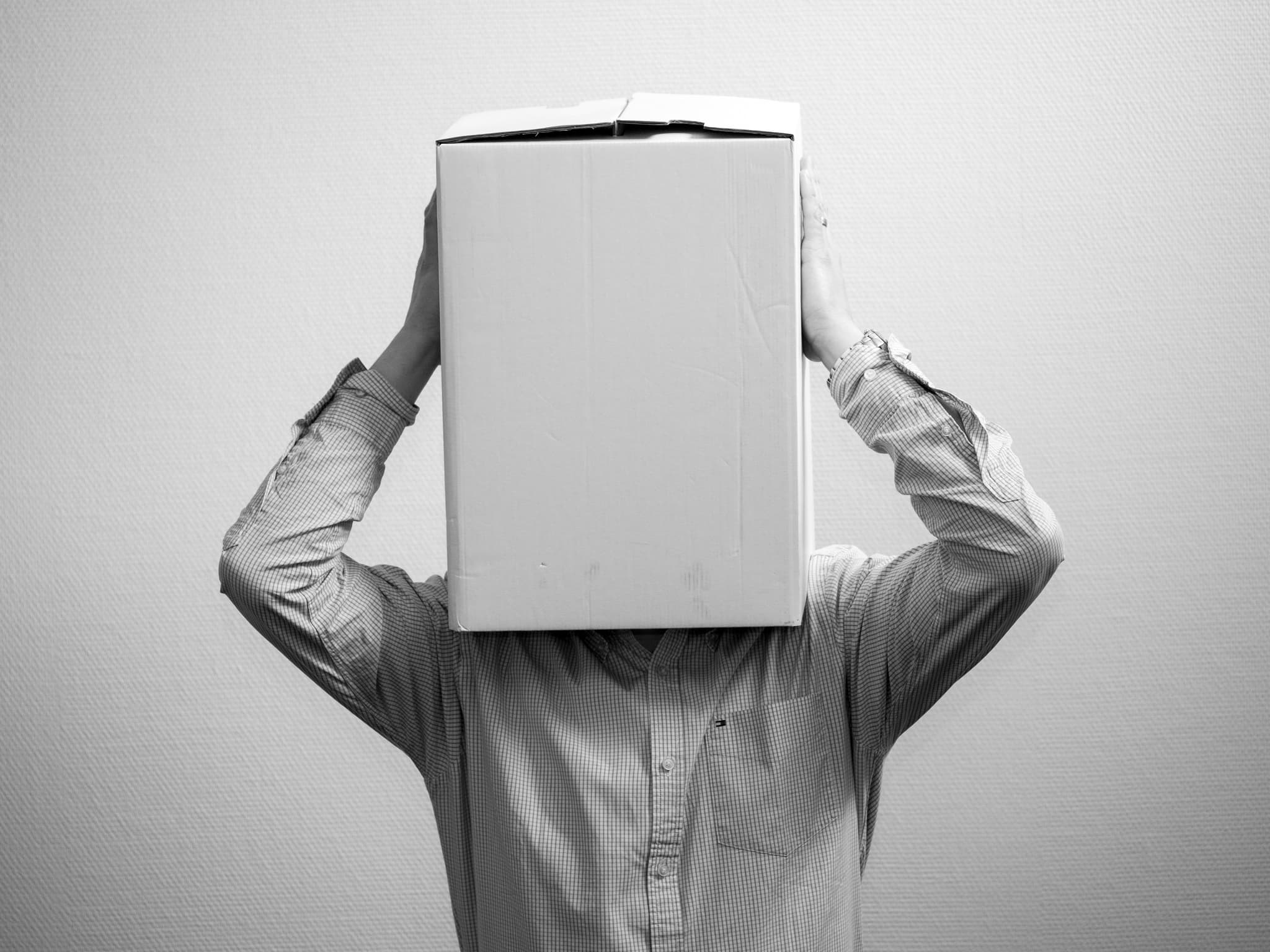 A man with box on his head